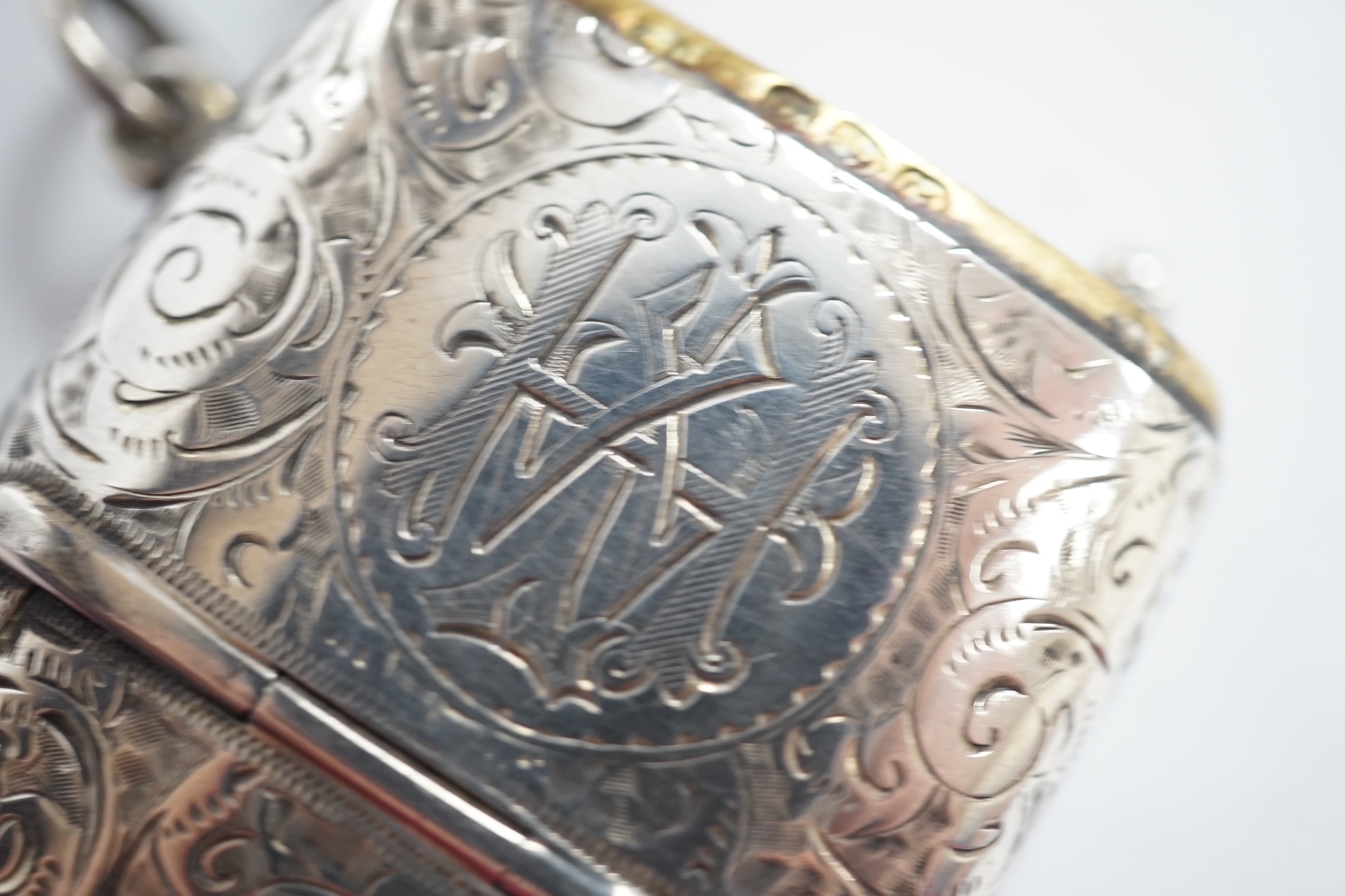 A late Victorian silver combination sovereign and vesta case, with pencil (lacking another item?, William Neale, Chester, 1890, 59mm. Condition - fair to good